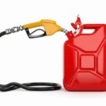 Gas pump nozzle and jerrycan on white background